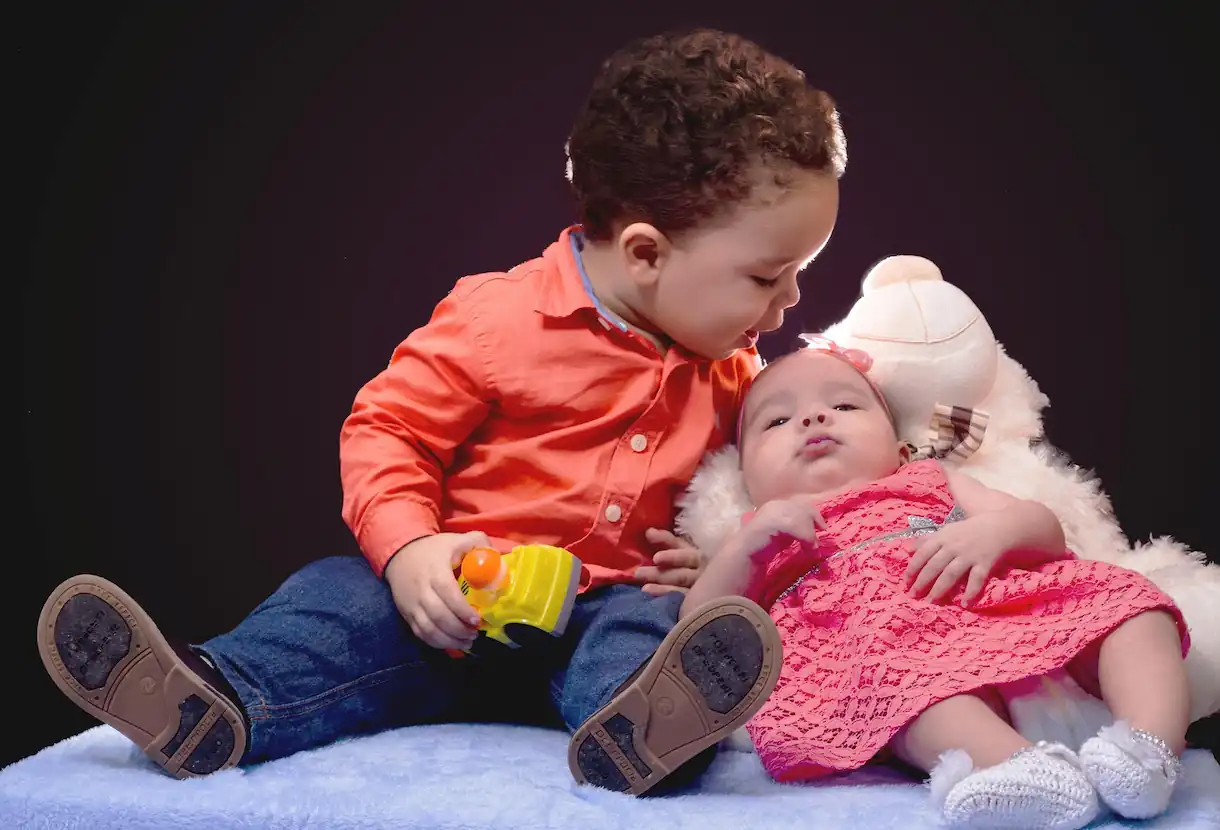Siblings sharing a special bond in a portrait